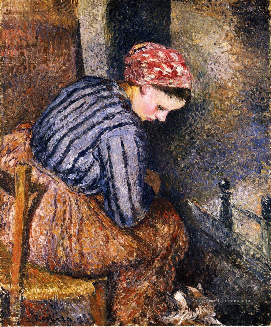 paysanne se réchauffant 1883 Camille Pissarro Peintures à l'huile